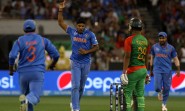 Melbourne: Indian bowler Umesh Yadav celebrates fall of a wicket during the ICC World Cup - 2015 quarter final match between India and Bangladesh at Melbourne Cricket Ground in Australia on March 19, 2015. (Photo: IANS)