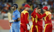 Auckland: Zimbabwean cricketers celebrate fall of Indian batsman Virat Kohli's wicket during an ICC World Cup 2015 match between India and Zimbabwe at the Eden Park in Auckland, New Zealand on March 14, 2015. (Photo: IANS)