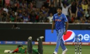 Melbourne: Indian bowler Umesh Yadav celebrates fall of a wicket during the ICC World Cup - 2015 quarter final match between India and Bangladesh at Melbourne Cricket Ground in Australia on March 19, 2015. (Photo: IANS)