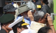 Prime Minister Narendra Modi and Union Defence Minister Manohar Parrikar watch aerobatics performed by IAF pilots at the Aero India-2015 Air Show, at Yelahanka Air-force Station, in Bengaluru on Feb 18, 2015.