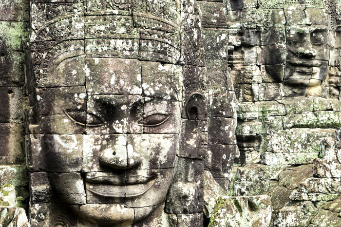 Bayon faces Temple in Cambodia (Image © iStock.com/egadolfo)