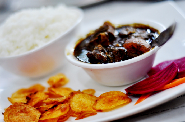 'Black Beauty' with rice, potato crisps and pickles. Image source: Dipankar Paul/Folomojo