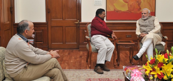 AAP convenor Arvind Kejriwal and PM Narendra Modi meet at 7, RCR, New Delhi, as Manish Sisodia looks on. Photo courtesy:http://pmindia.gov.in/en/