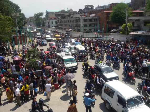People gather on a street after an earthquake in Kathmandu, Nepal, May 12, 2015. (Image source: IANS)