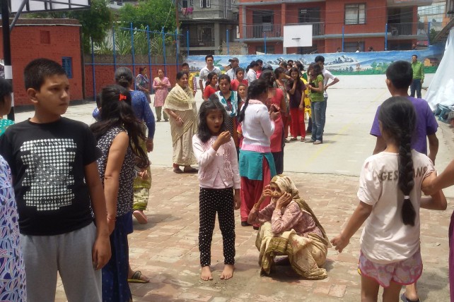 People gather at an open ground after an earthquake in Kathmandu, Nepal, May 12, 2015. (Image source: IANS)