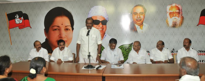 AIADMK treasurer and Chief Minister Minister O. Panneerselvam and party MLAs during their meeting to elect their party supremo J. Jayalalithaa as AIADMK Legislature Party leader, at their party headquarters in Chennai on May 22, 2014.  ( Photo : IANS )