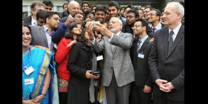 Modi with students in France |   Image courtesy: lh3.googleusercontent.com