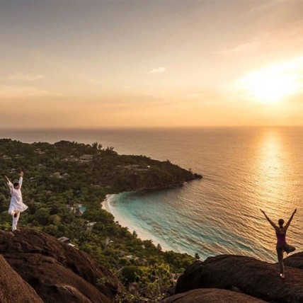 Check this #amazing #homage to #sun #god and #spectacular #views. Don't #miss the two #people doing #yoga at the top of the #hill in #Fourseasons #seychelles ☀️🌅 the #serenity around. All that was missing was the sound of #OM #mantra 🙏👍🌍 #spiritual #wellbeing #tranquility #harmony #peace #inner-soul. A #life #style one must #adopt. Keeping ones #mind #body and chakras all aligned (Image courtesy: instagram.com)