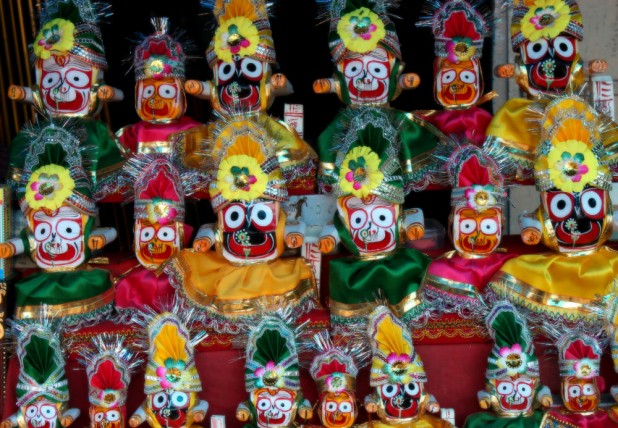 Idols of the Trinity being sold in Puri
