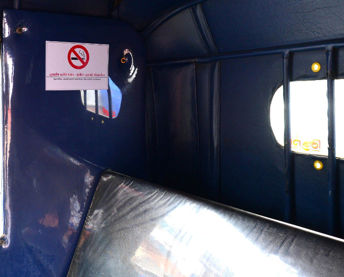 'No Smoking' signage displated inside an autorickshaw