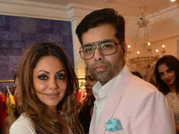 Why does Karan Johar keep a picture of Shahrukh-Gauri in his room?
